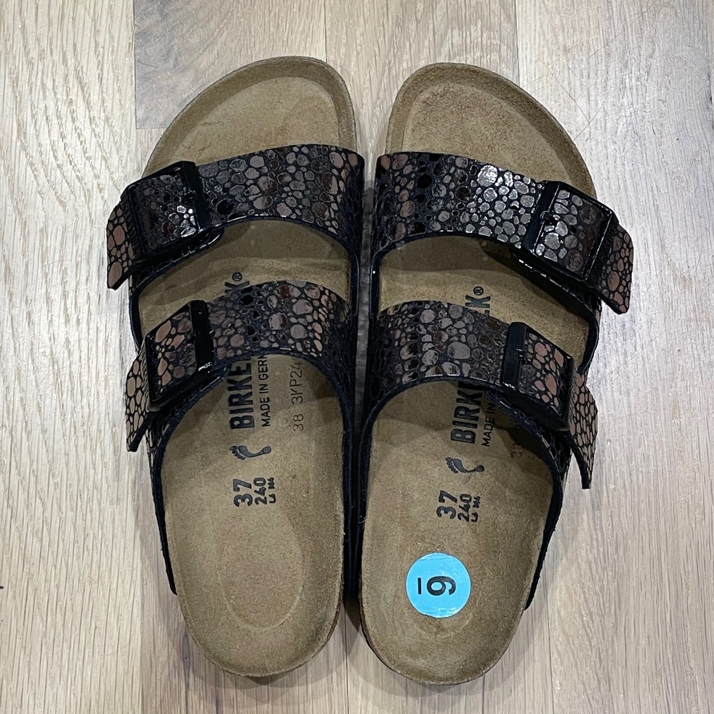 Women’s black with animal print Birkenstock Arizona Sandals size 37